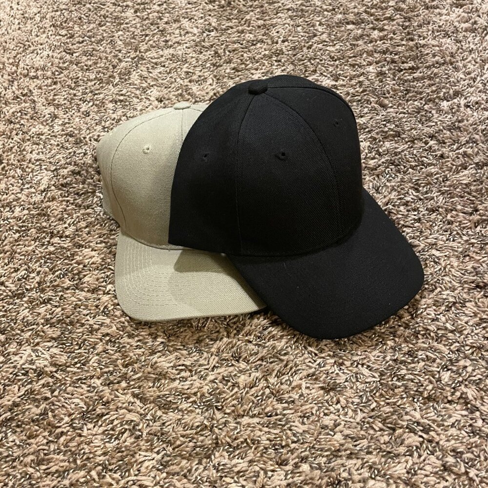 Black and cream baseball caps, plain